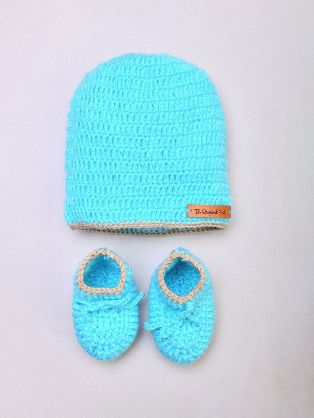 

The Original Knit Infants Self Design Acrylic Beanie Cap With Socks, Blue
