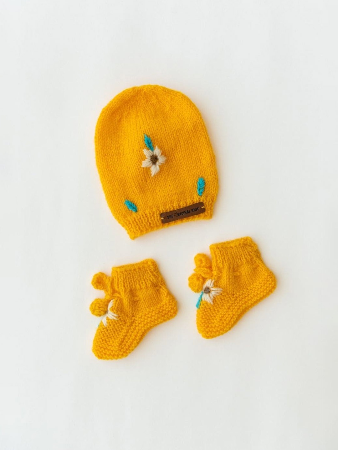 

The Original Knit Kids Self Design Acrylic Beanie Cap With Socks, Yellow