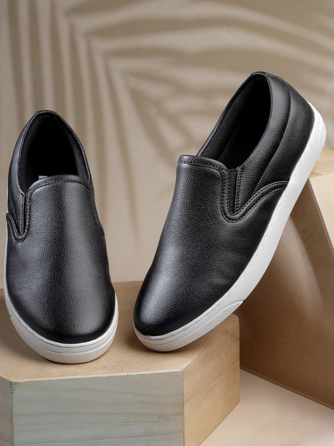 

The Roadster Lifestyle Co. Women Black Textured Slip-On Sneakers