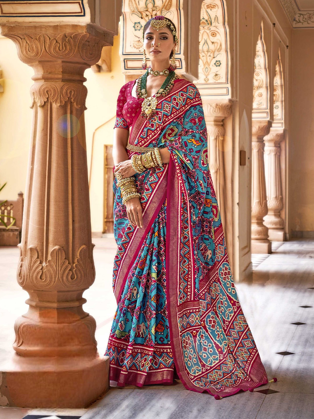 

Mitera Blue Ethnic Motifs Printed Zari Detail Patola Saree