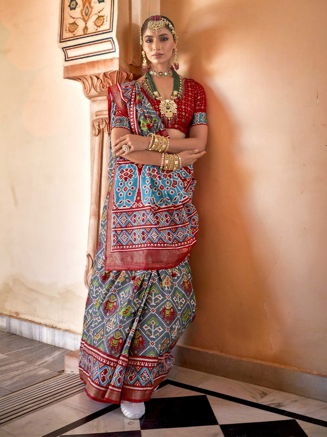 

Mitera Grey Ethnic Motifs Printed Zari Patola Saree