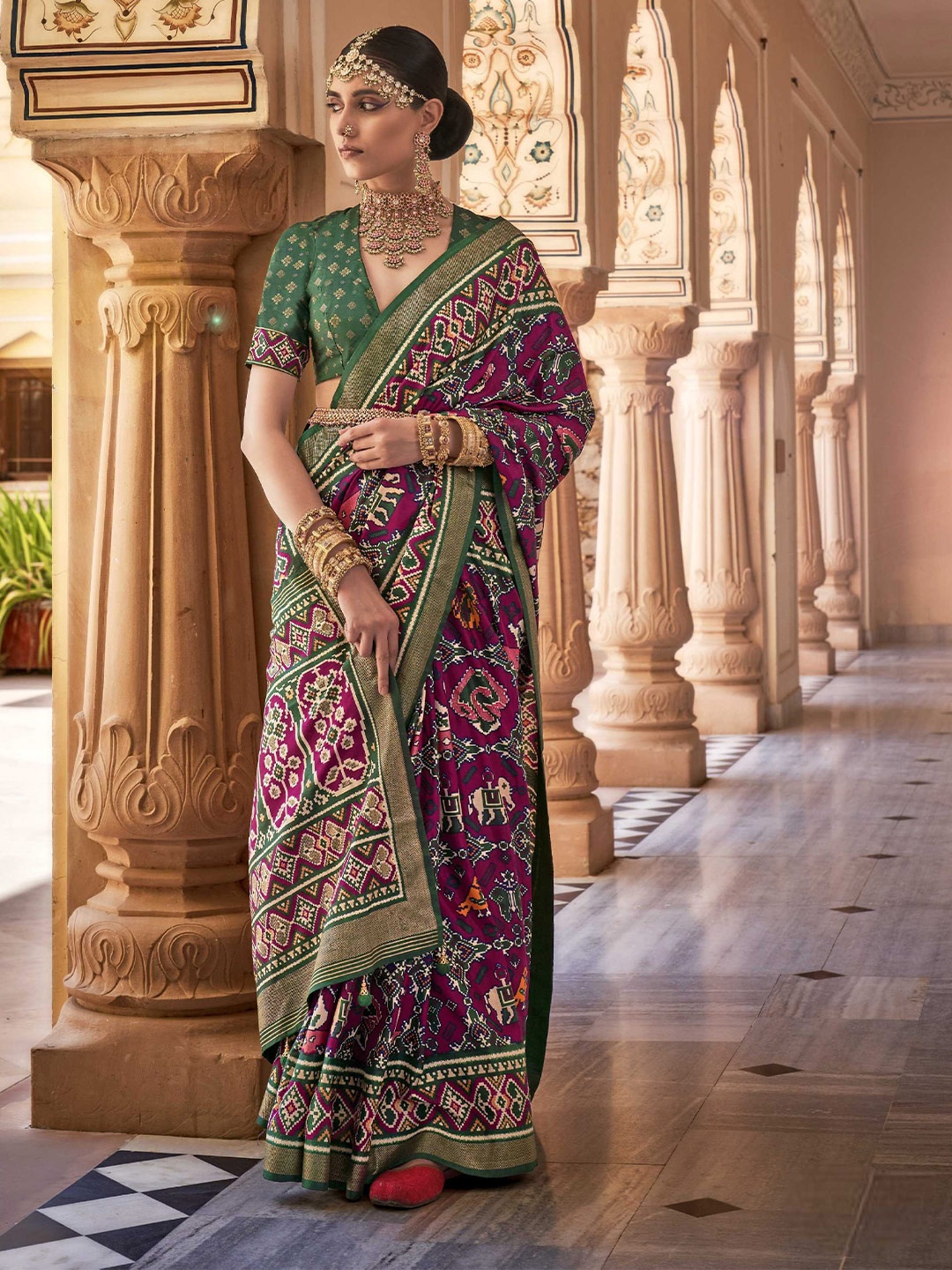 

Mitera Purple Ethnic Motifs Printed Zari Detail Patola Saree