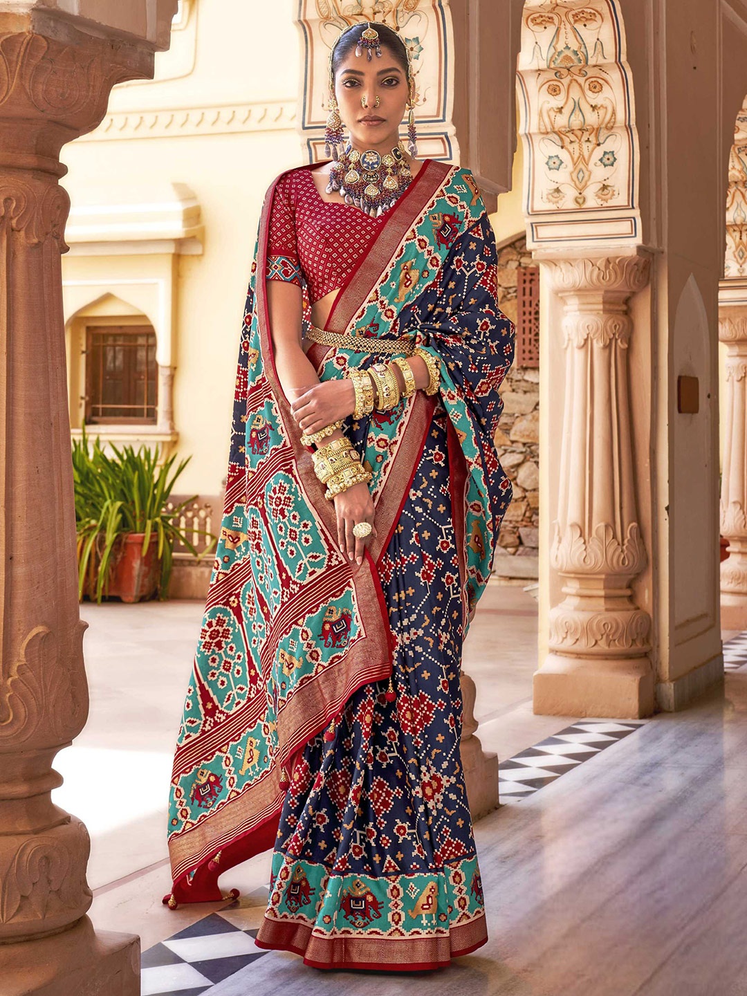 

Mitera Ethnic Motifs Printed Zari Patola Saree, Navy blue
