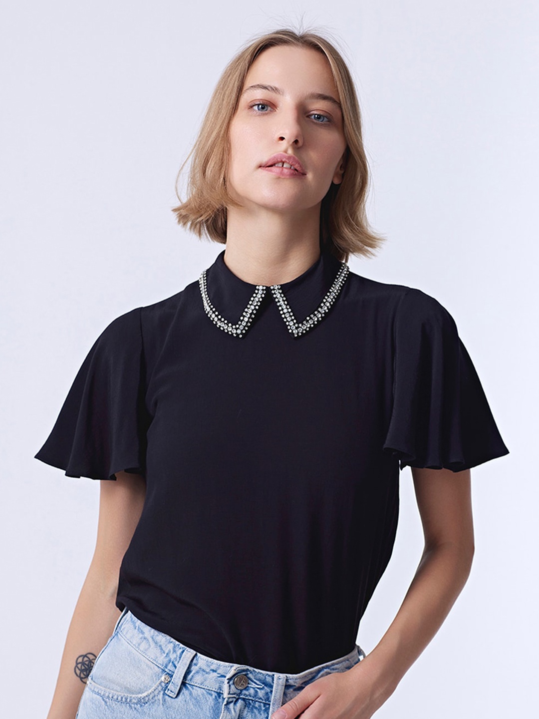 

COVER STORY Black Peter Pan Collar Flared Sleeves Crepe Beads & Stones Top