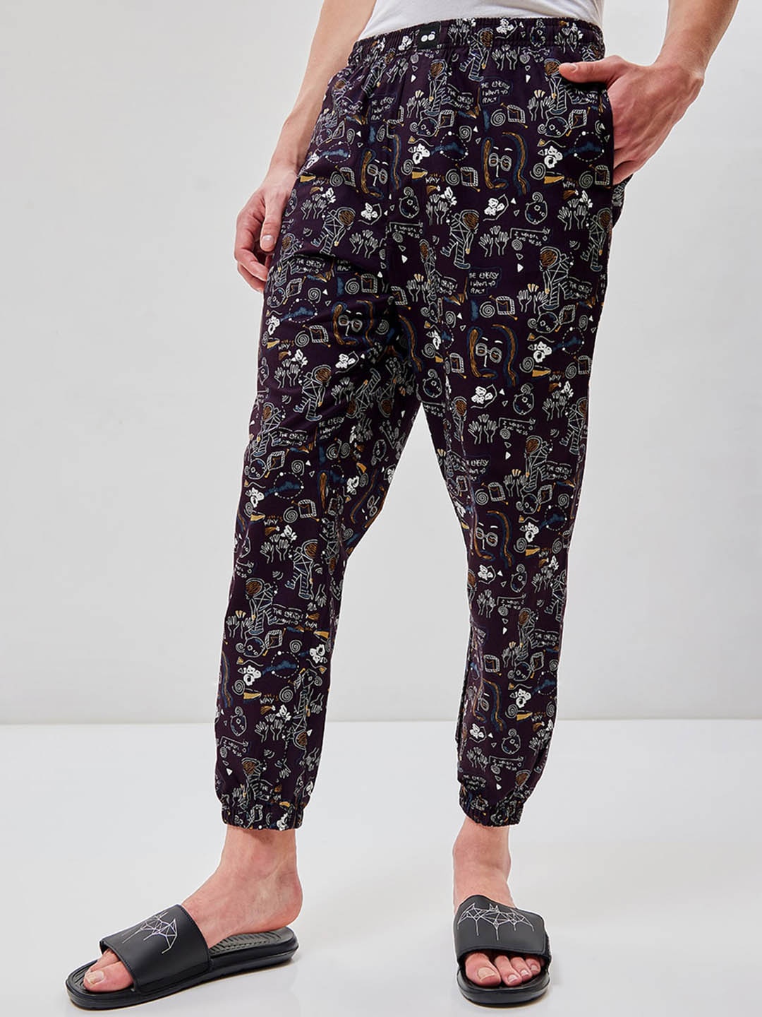 

Bewakoof Men Black Mid-Rise Printed Cotton Lounge Pants