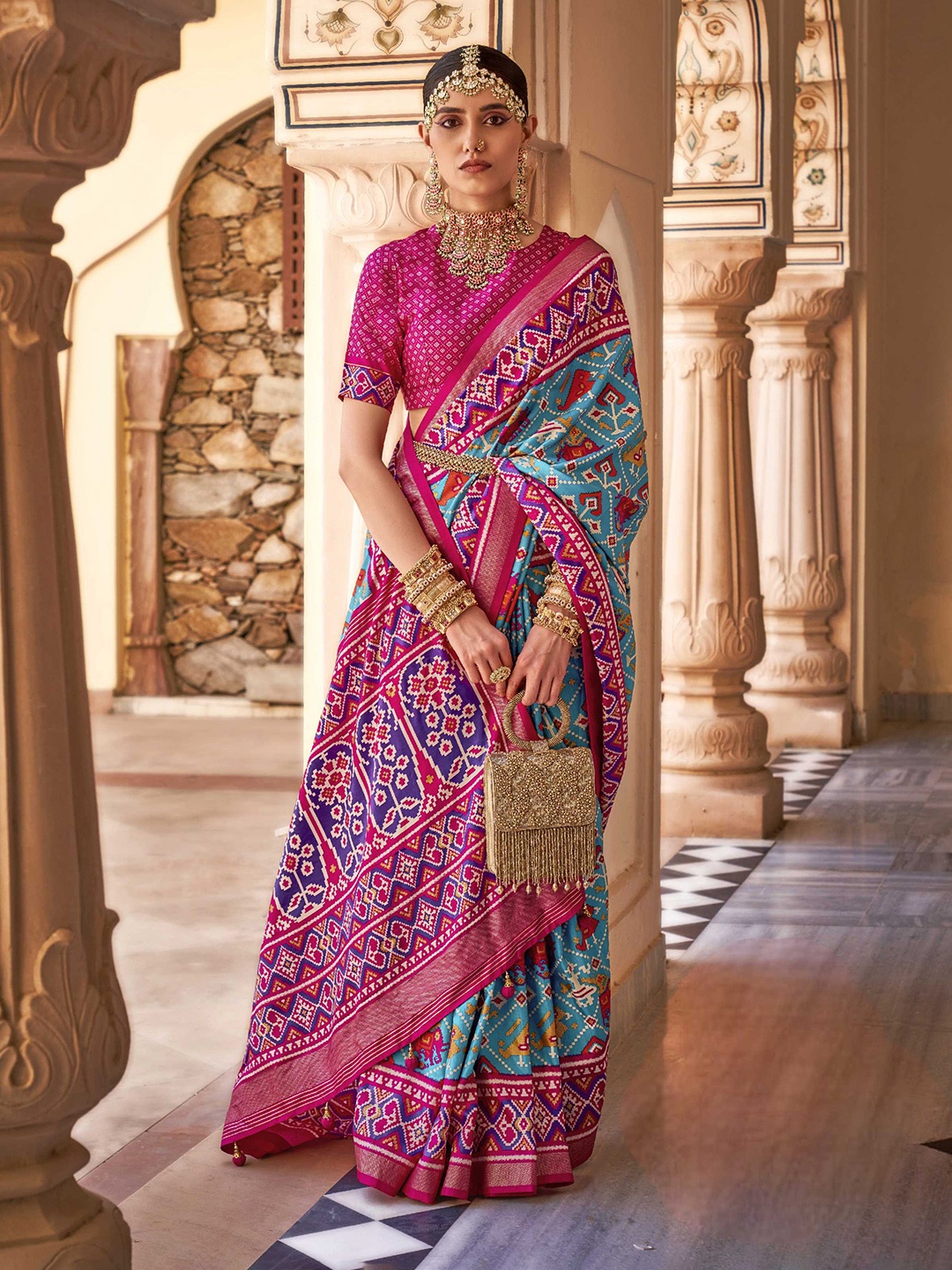 

Mitera Blue Ethnic Motifs Printed Zari Detail Patola Saree