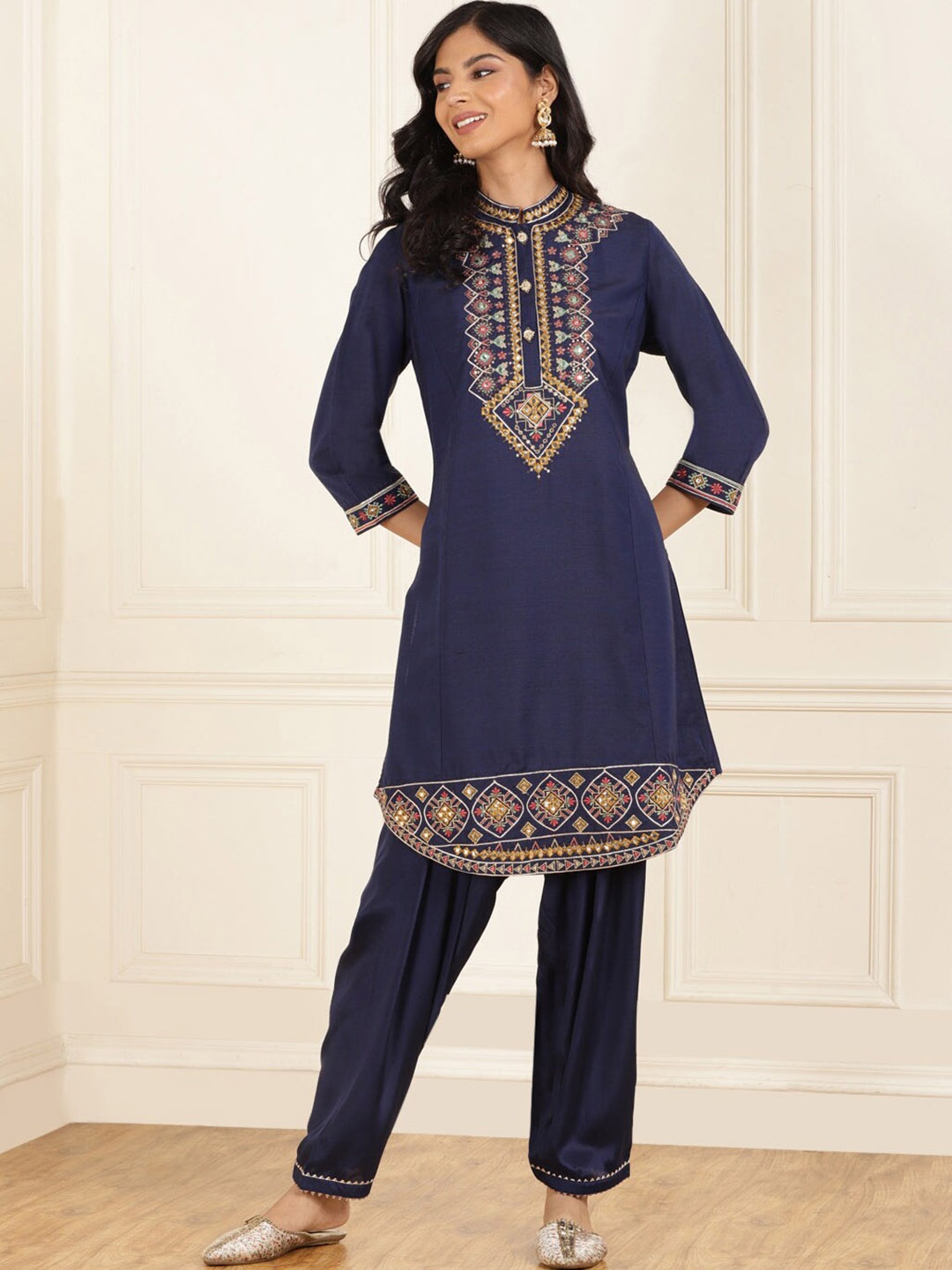 

Lakshita Ethnic Motifs Yoke Design Regular Mirror Work Kurta with Trousers, Navy blue