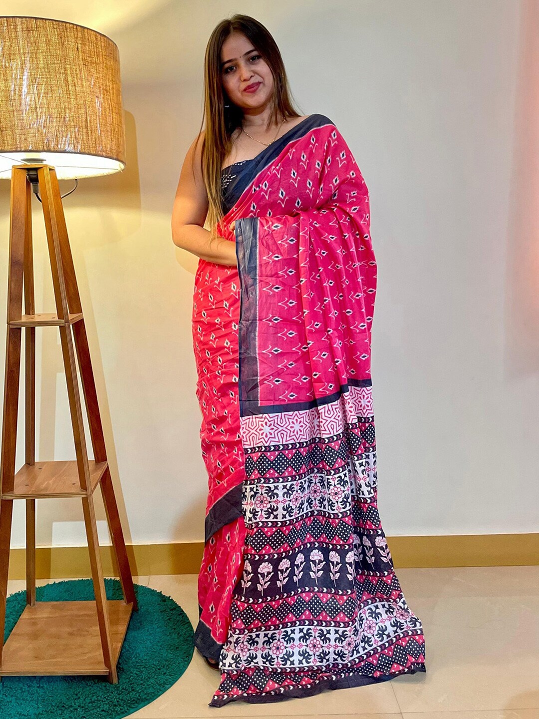 

Saree mall Pink & Purple Ethnic Motifs Pure Cotton Ikat Sarees