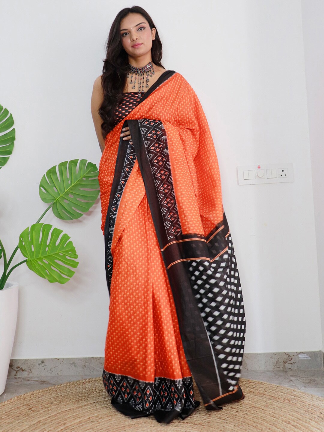 

Saree mall Orange Black Ethnic Motifs Printed Poly Cotton Sarees