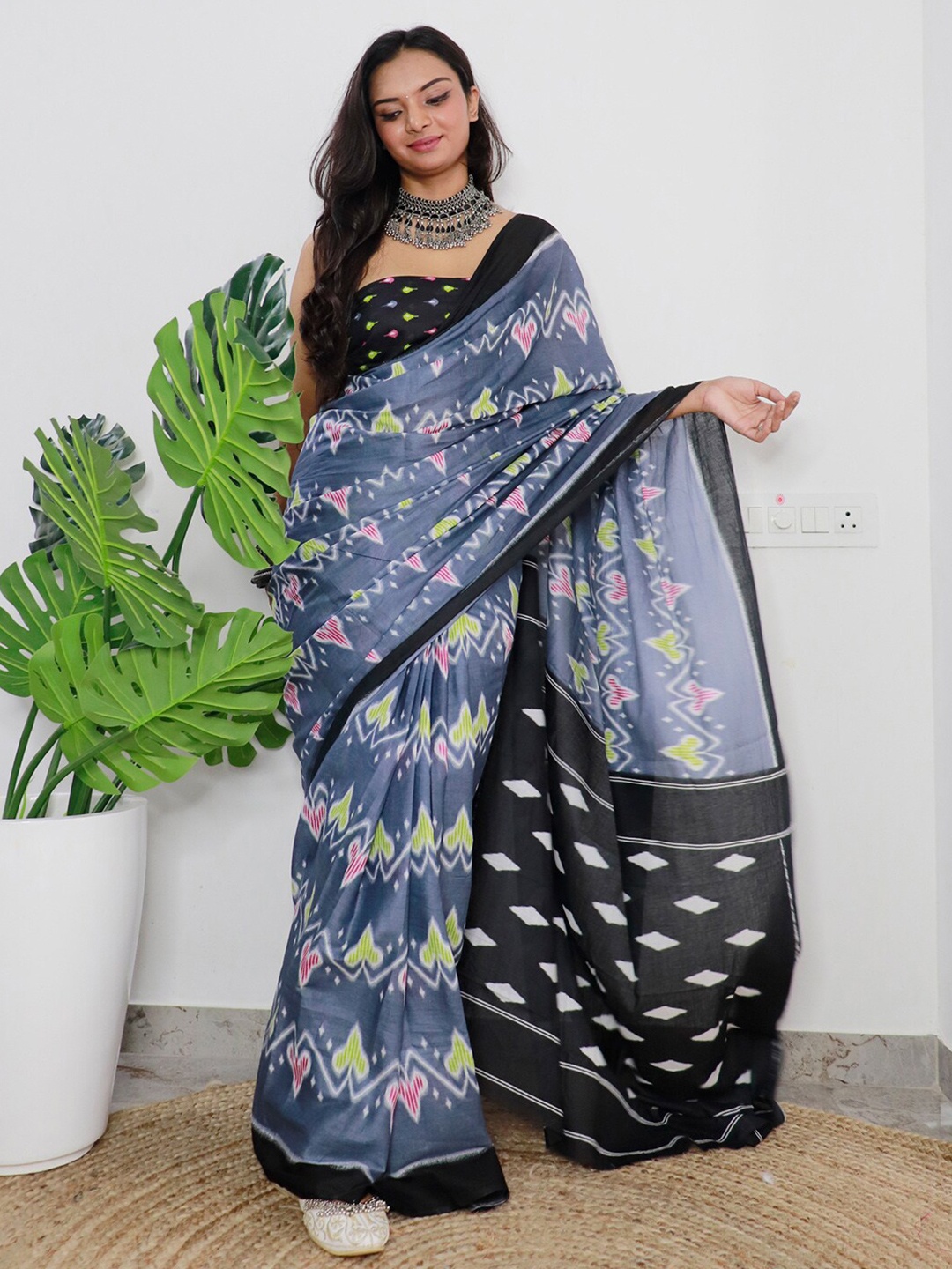 

Saree mall Ethnic Motifs Printed Poly Cotton Ikat Sarees, Grey