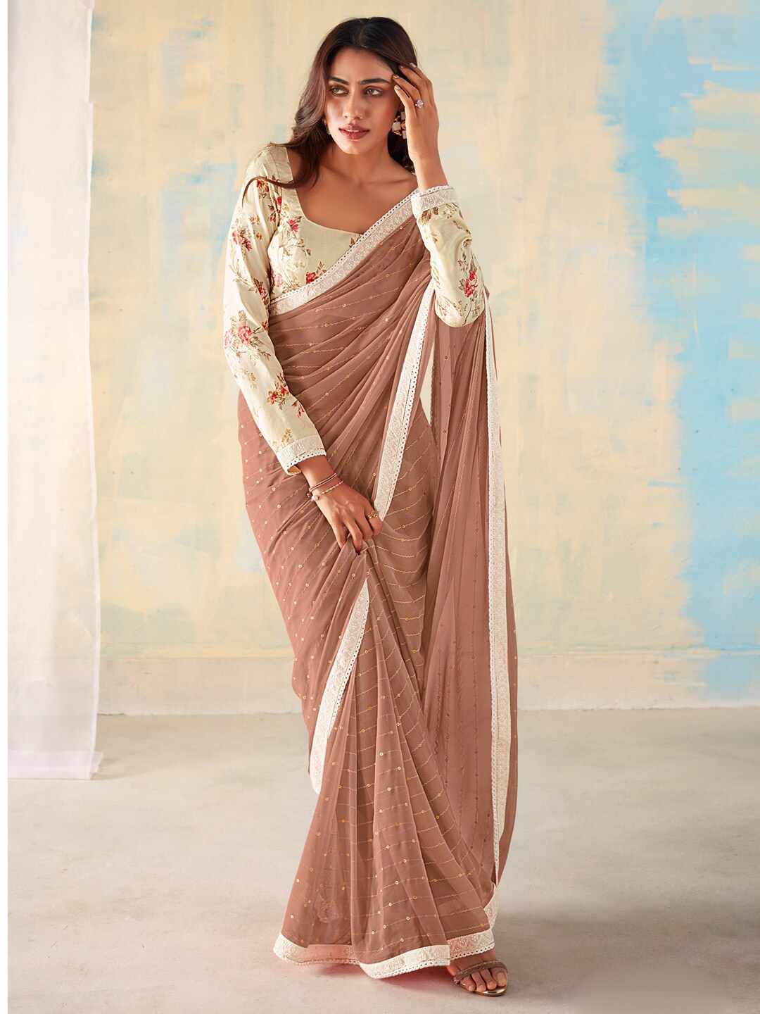 

Saree mall Brown White Embellished Sequinned Poly Georgette Saree
