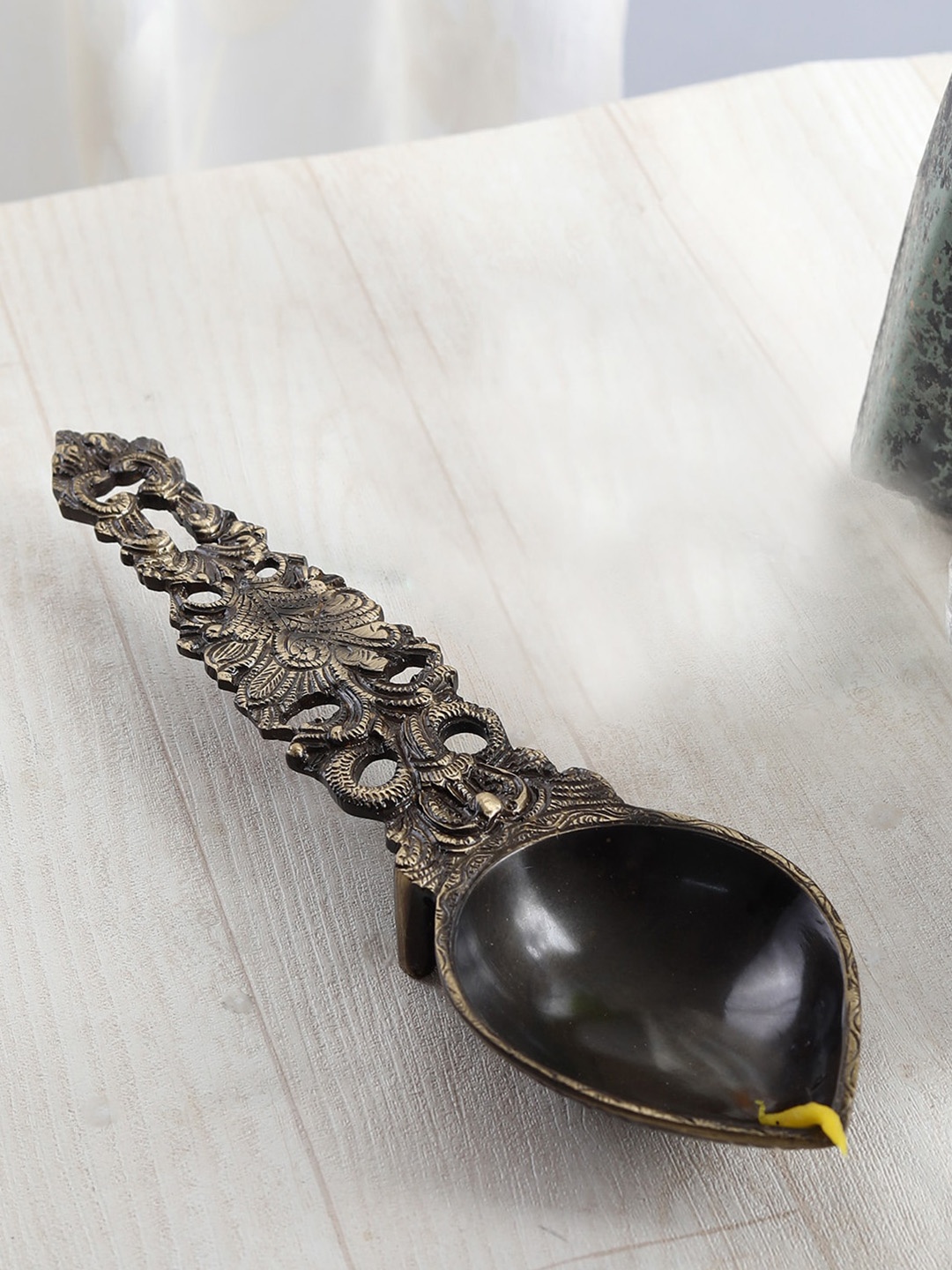 

Two Moustaches Brown Brass Sheshnag Aarti Spoon Diyas