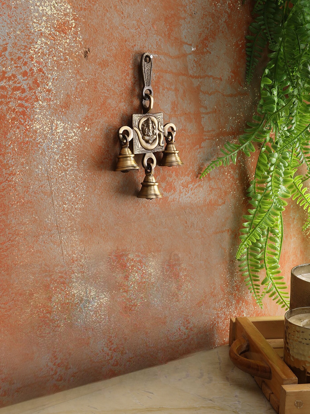 

Two Moustaches Brown Brass Om & Ganesha Wall Decor With Hanging Bells