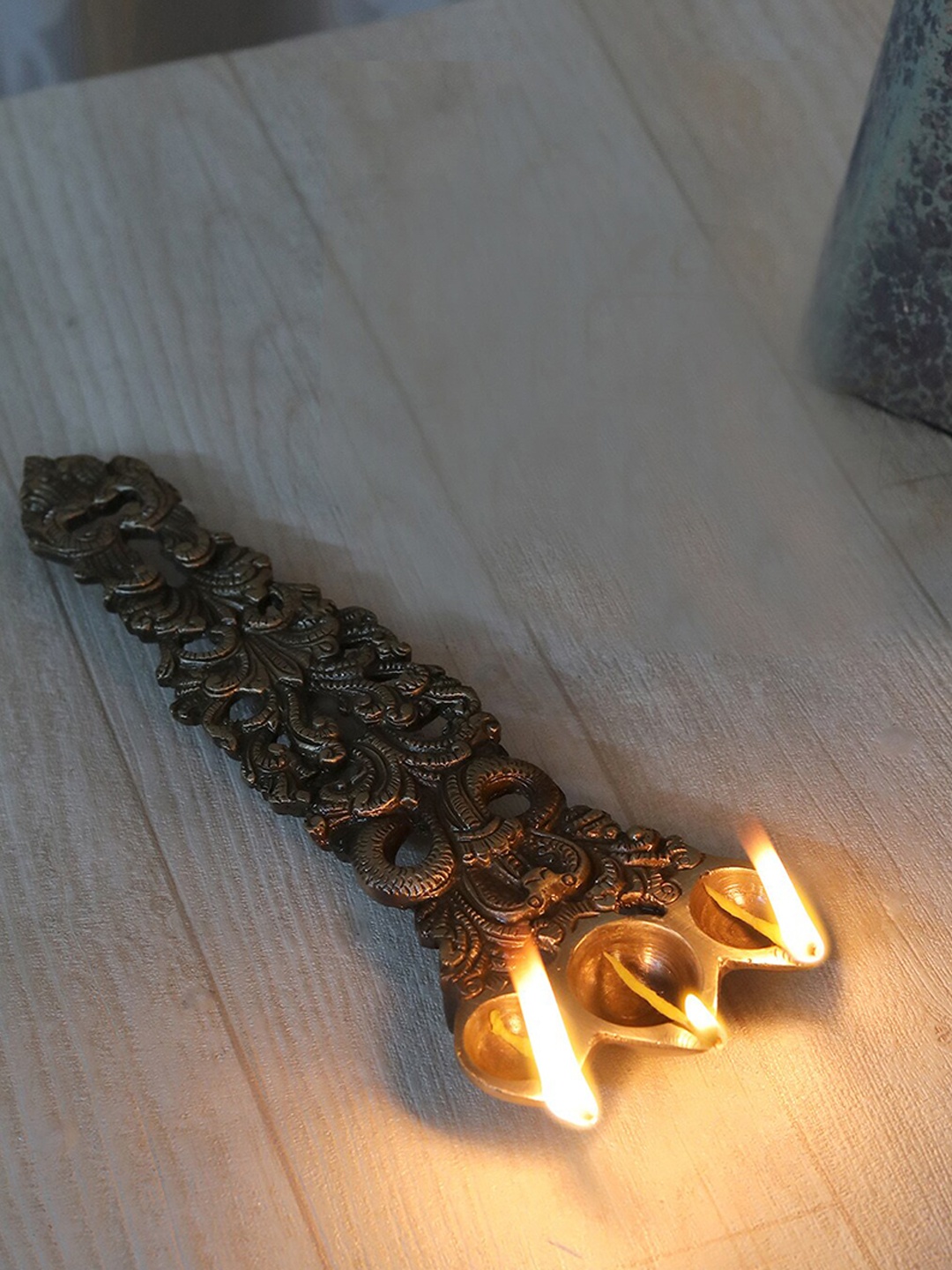 

Two Moustaches Brown Sheshnag Design Brass Pooja Spoon