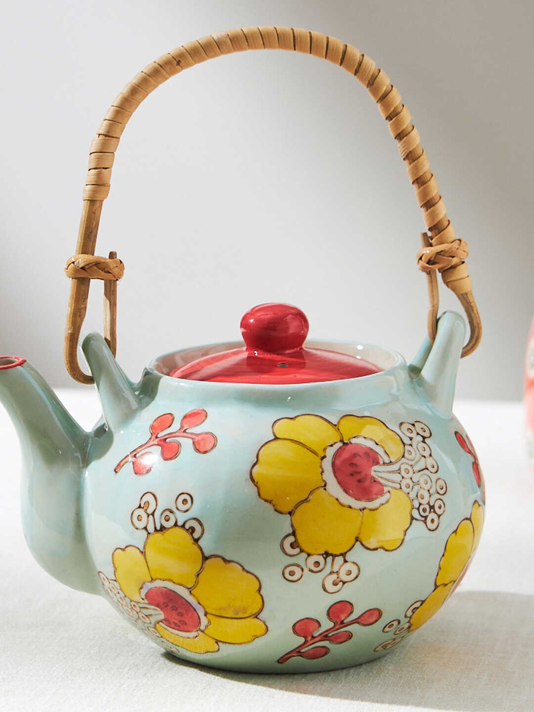 

Chumbak Teal & Red Hibiscus Bloom Printed Ceramic Matte Kettle