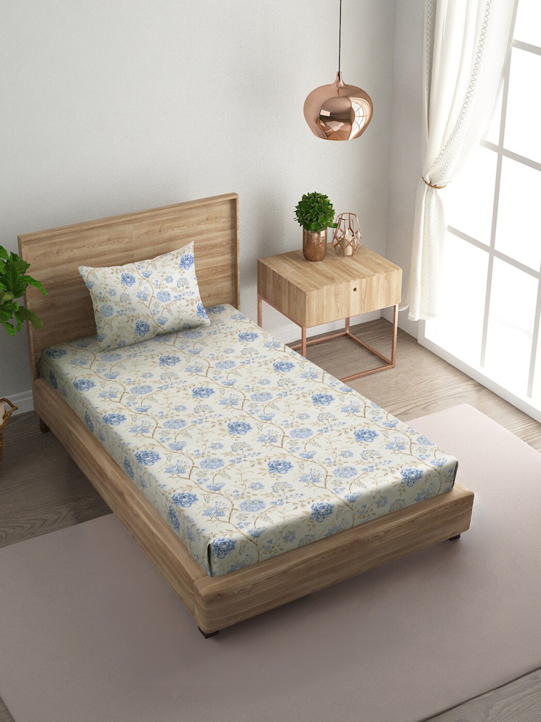 

Naksh White & Blue Floral Pure Cotton 144 TC Single Bedsheet with 1 Pillow Cover