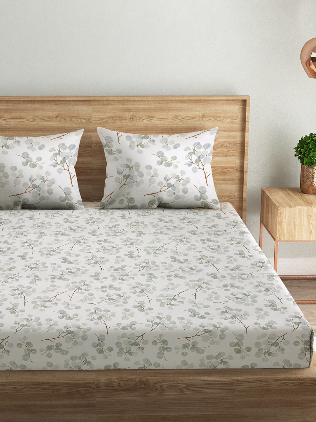 

Naksh White & Green Floral Pure Cotton 144 TC Queen Bedsheet with 2 Pillow Covers