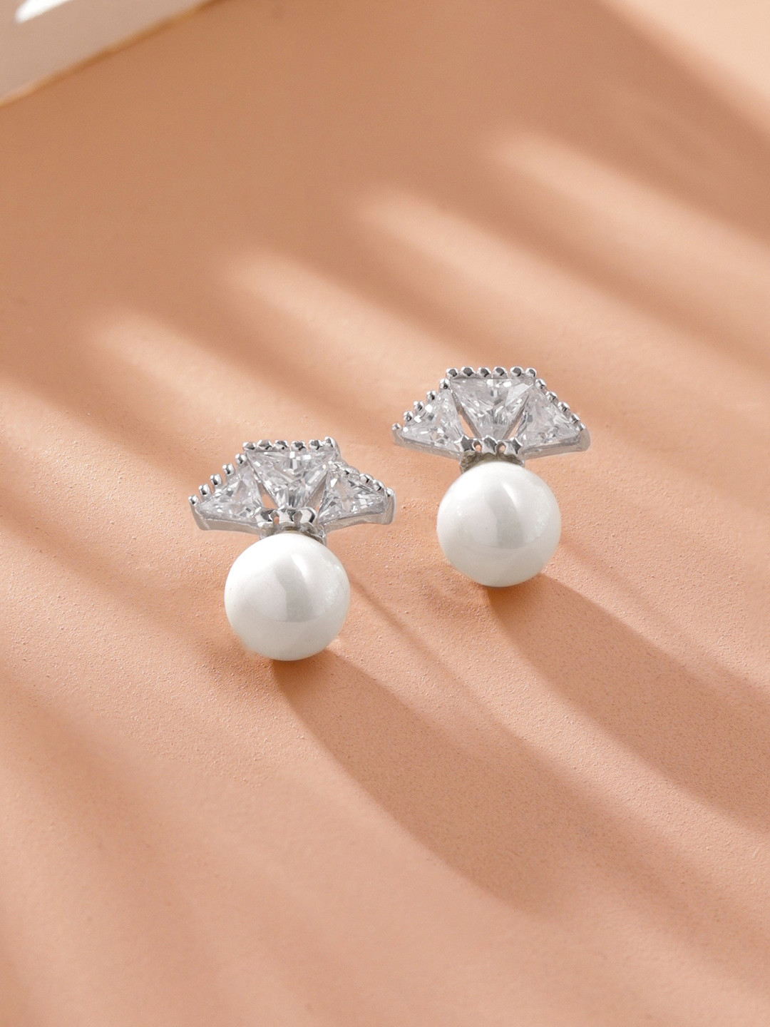 

Rubans Silver Rhodium Plated Sterling Silver American Diamond Studded Stud Earrings
