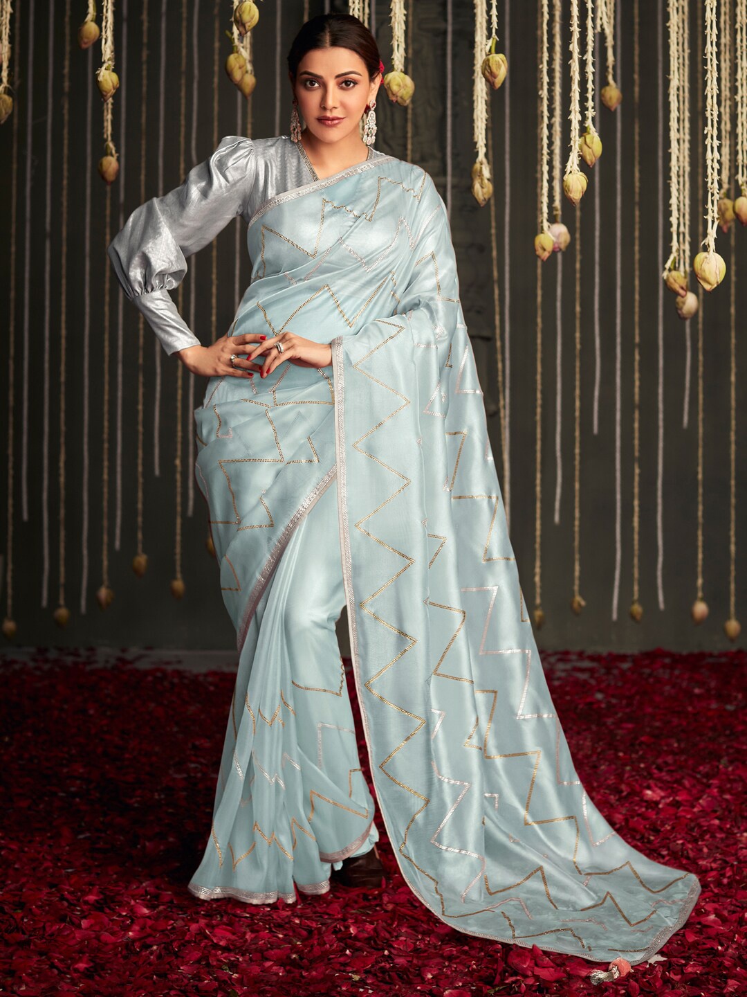 

Mitera Blue Embellished Mukaish Silk Blend Saree