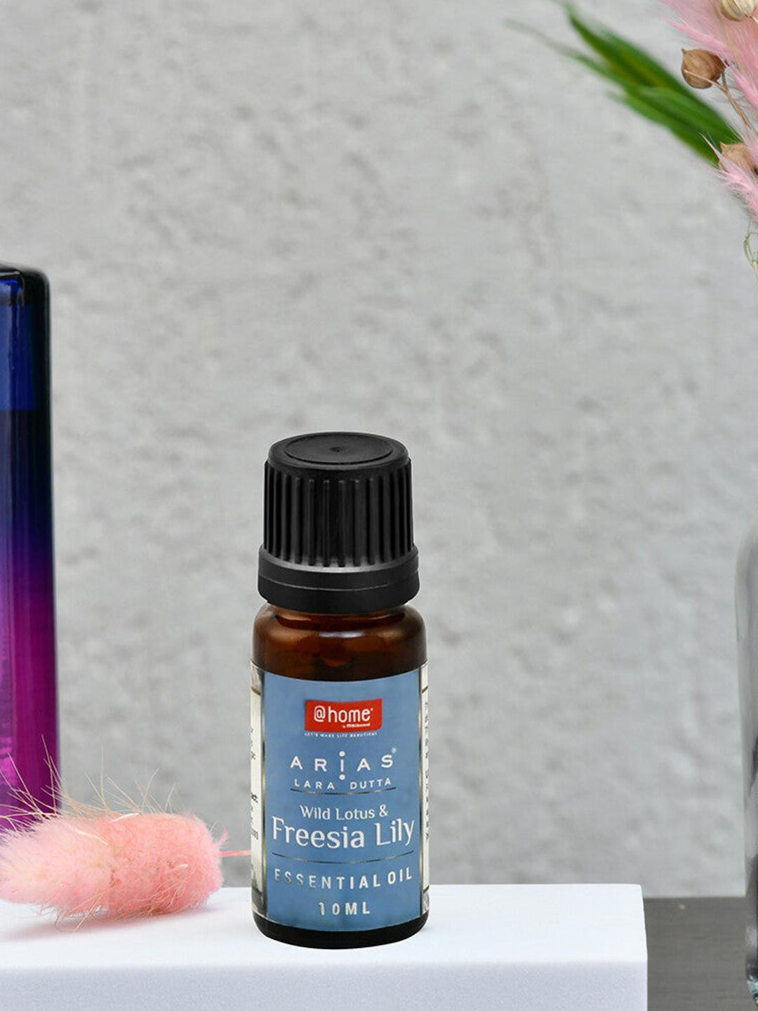 

Athome by Nilkamal Arias Blue Wild Lotus & Freesia Lily Aroma Oil With Potpourri 10ml