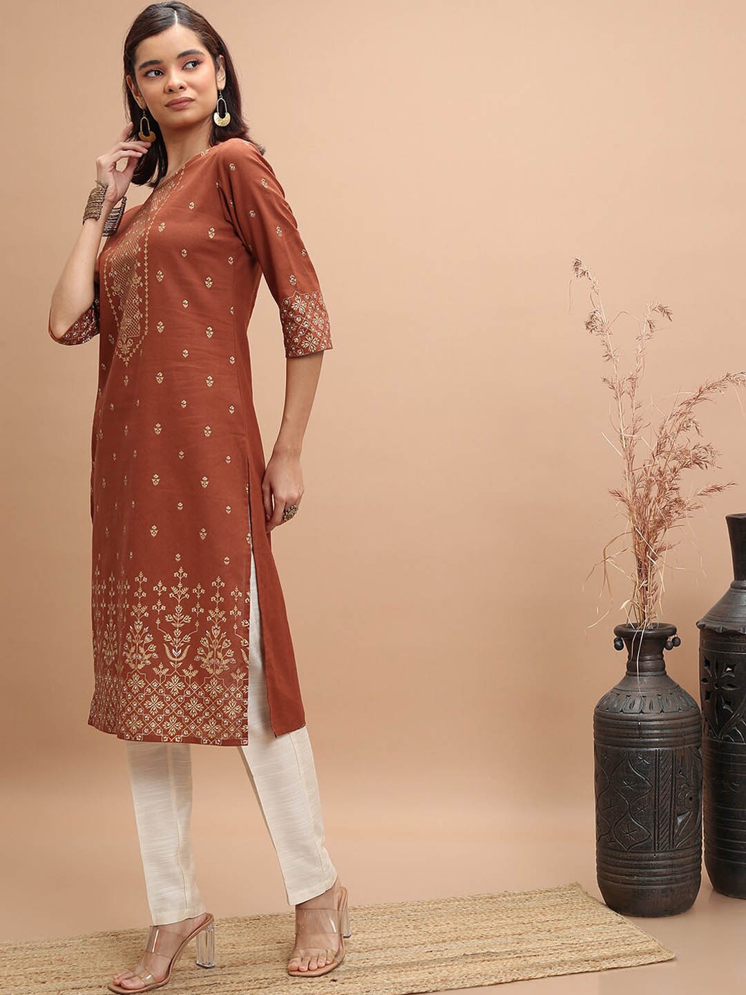 

Vishudh Rust Ethnic Motifs Printed Cotton Straight Kurta