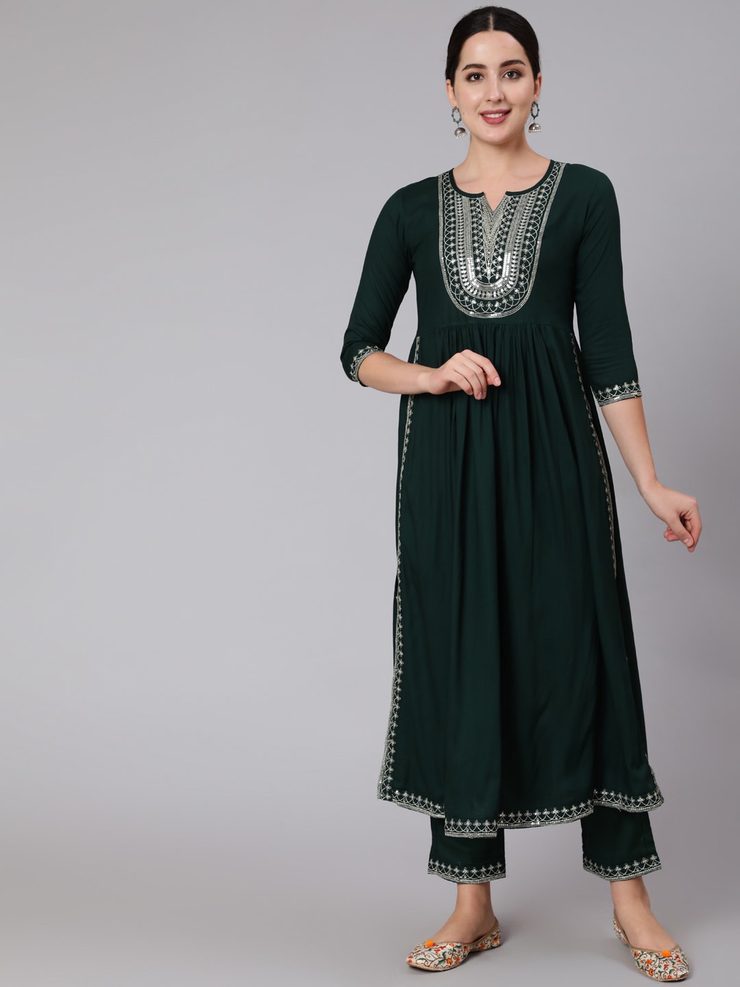 

KIMAYRA Ethnic Motifs Sequinned Yoke Design Regular Kurta With Trousers, Green