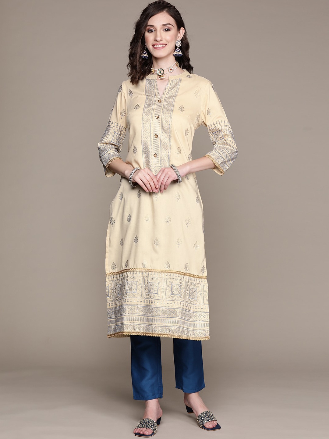 

Sangria Ethnic Motifs Printed Band Collar Kurta With Trouser, Cream