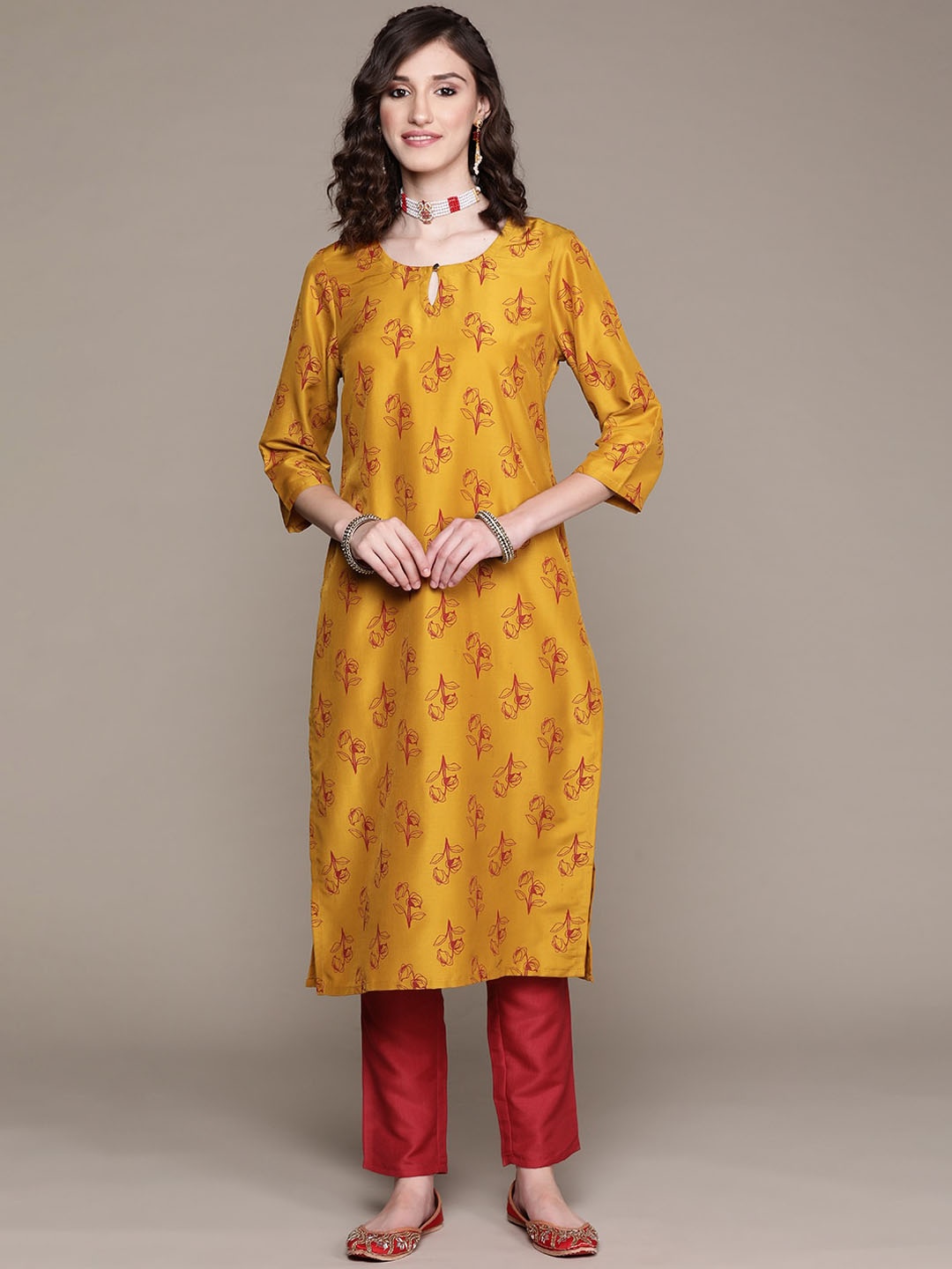 

Sangria Printed Keyhole Neck Kurta With Trousers, Mustard