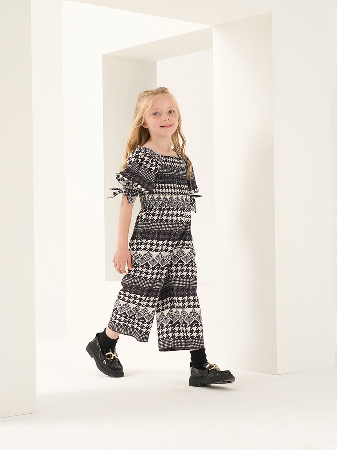 

Angel & Rocket Girls Conversational Printed Smocked Basic Jumpsuit, Black