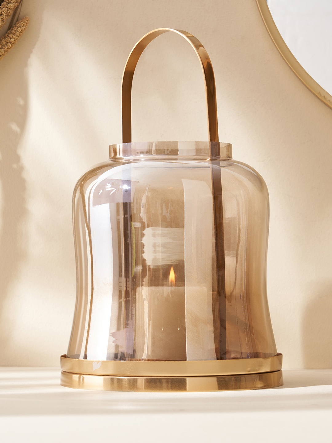 

Home Centre Brown Textured Glass Lantern With Handle, Gold