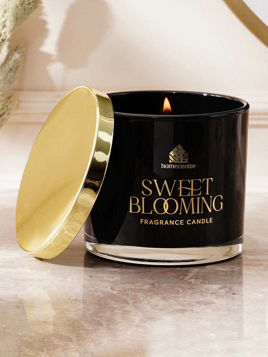 

Home Centre Enchanted Black Sweet Blooming Scented Jar Candle With Lid