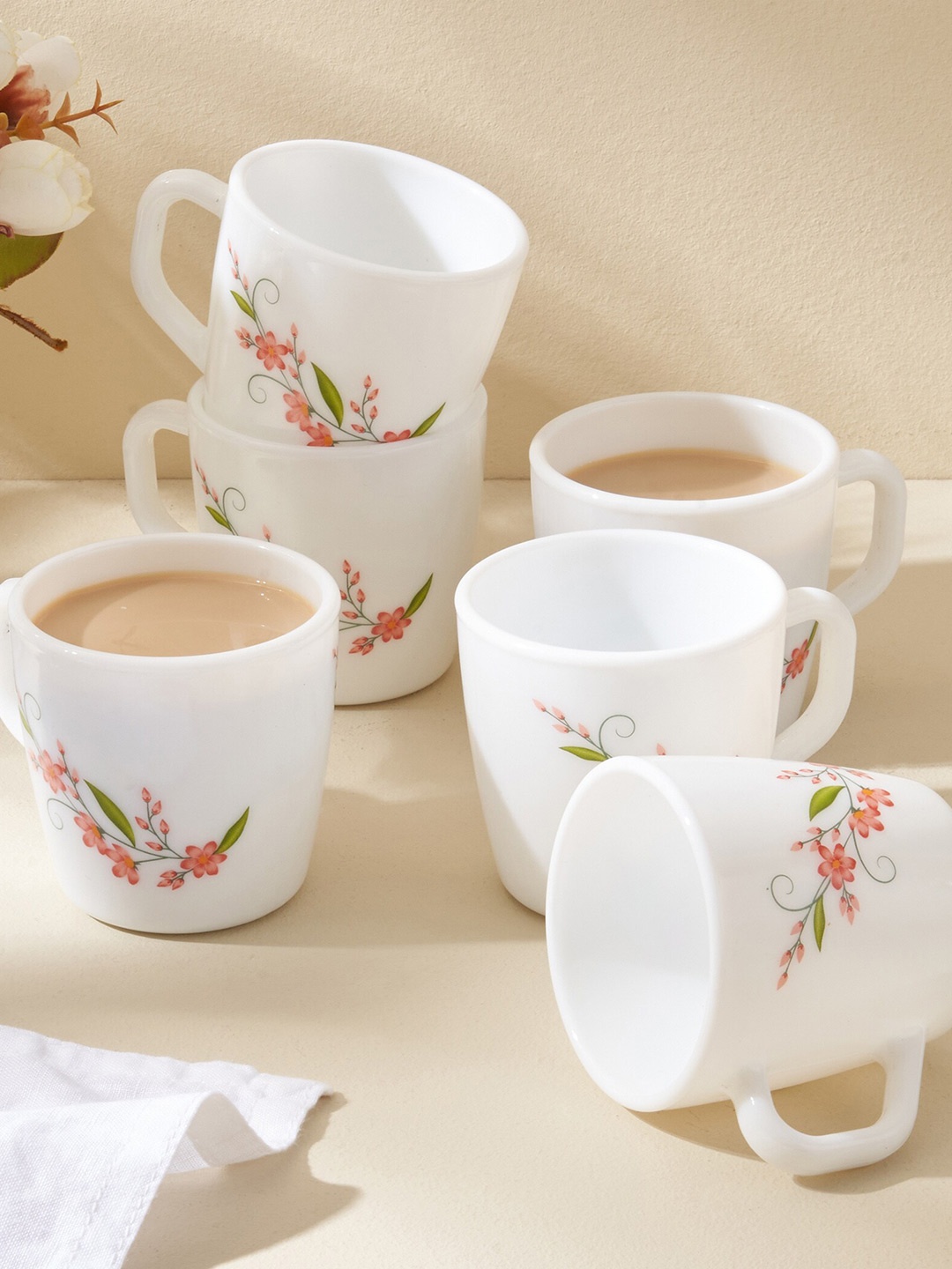 

Home Centre Velox Creeper White & Orange 6 Pieces Printed Glossy Cups With Saucers