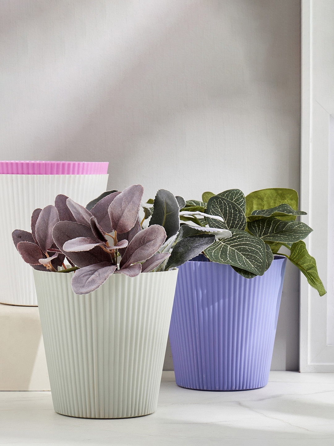 

Home Centre Grey Textured Planter
