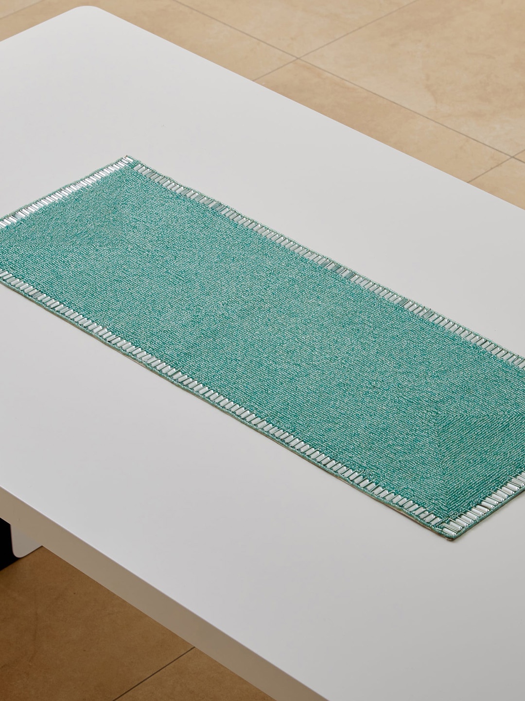 

Home Centre Teal Beads Embellished Table Runner