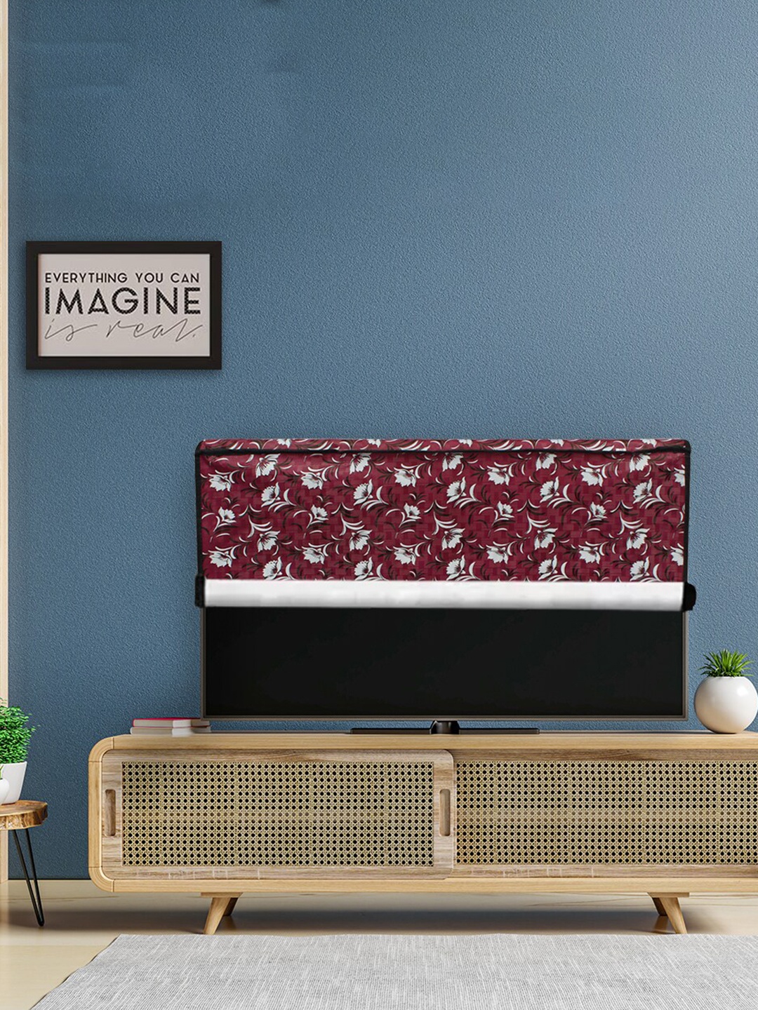 

DREAM CARE Red & White Printed Waterproof Flap TV Protector- 55 Inch
