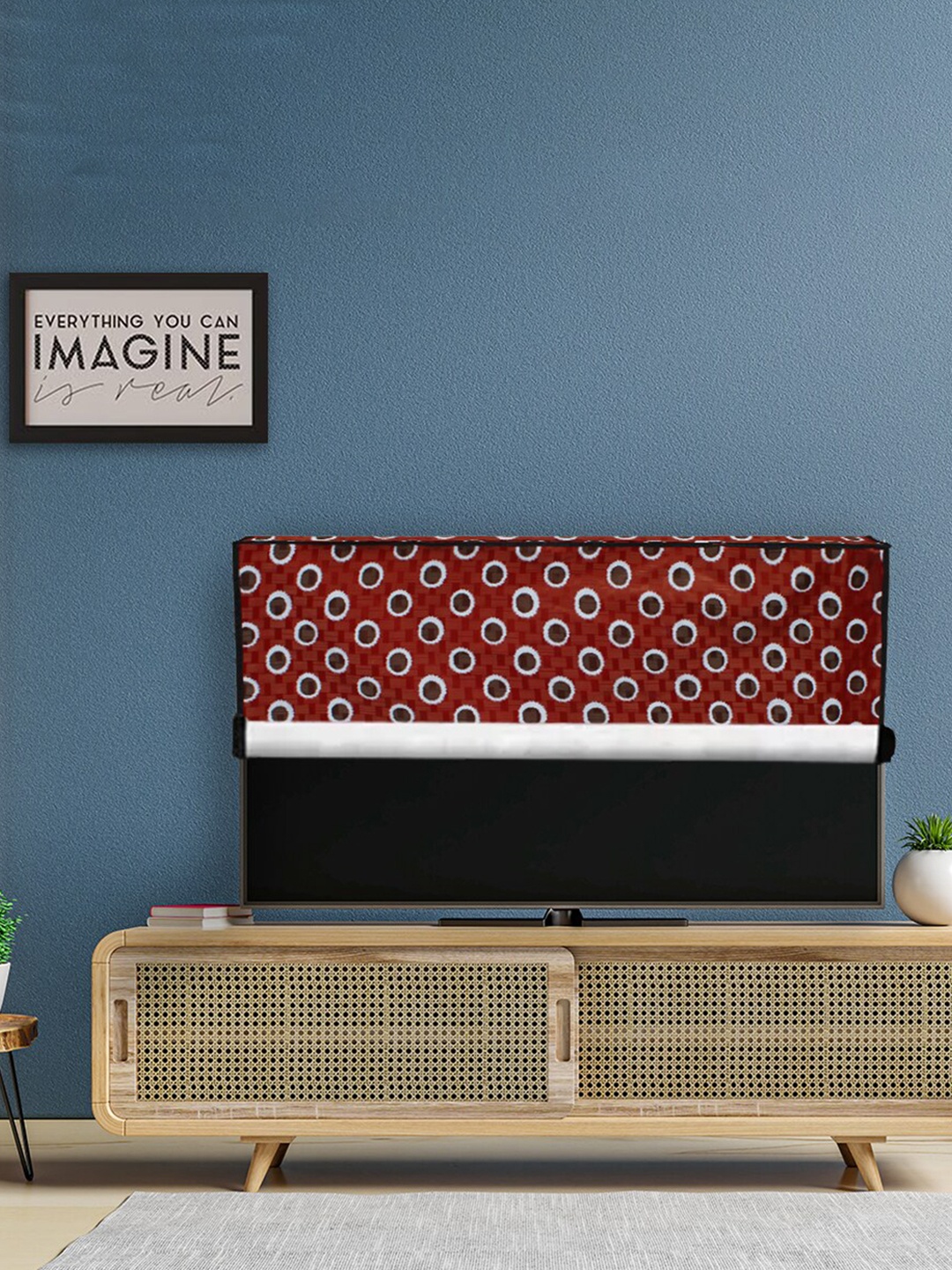 

DREAM CARE Red & White Printed Plastic Waterproof Flap TV Protector - 42 Inch