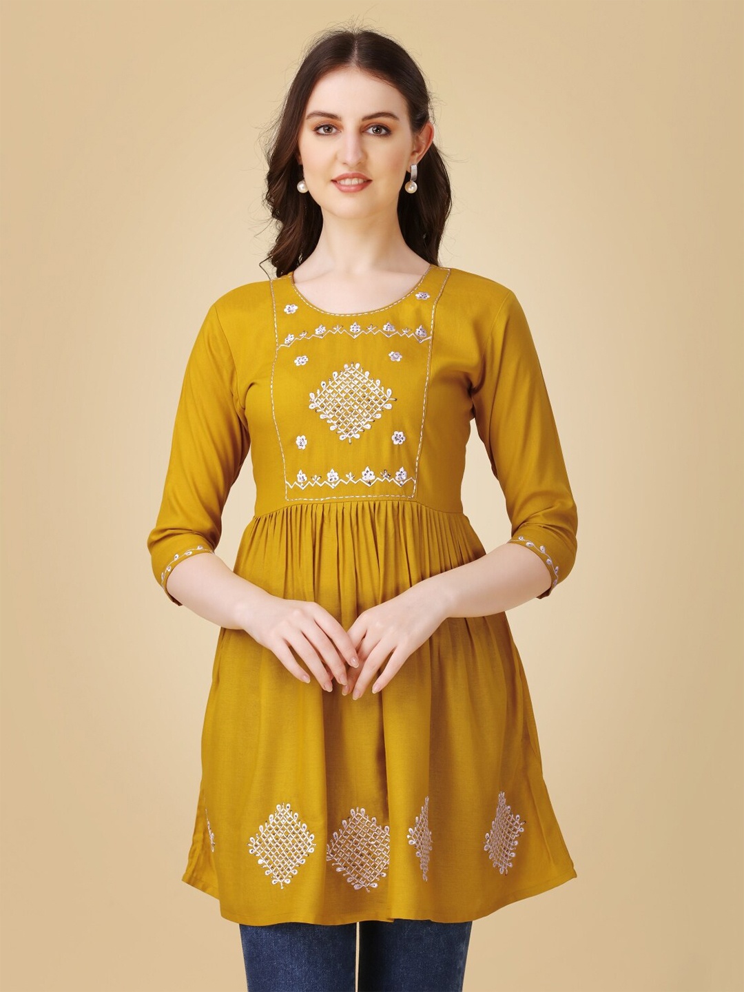 

Anouk Mustard Yellow Floral Embroidered Round Neck Thread Work A-Line Kurti