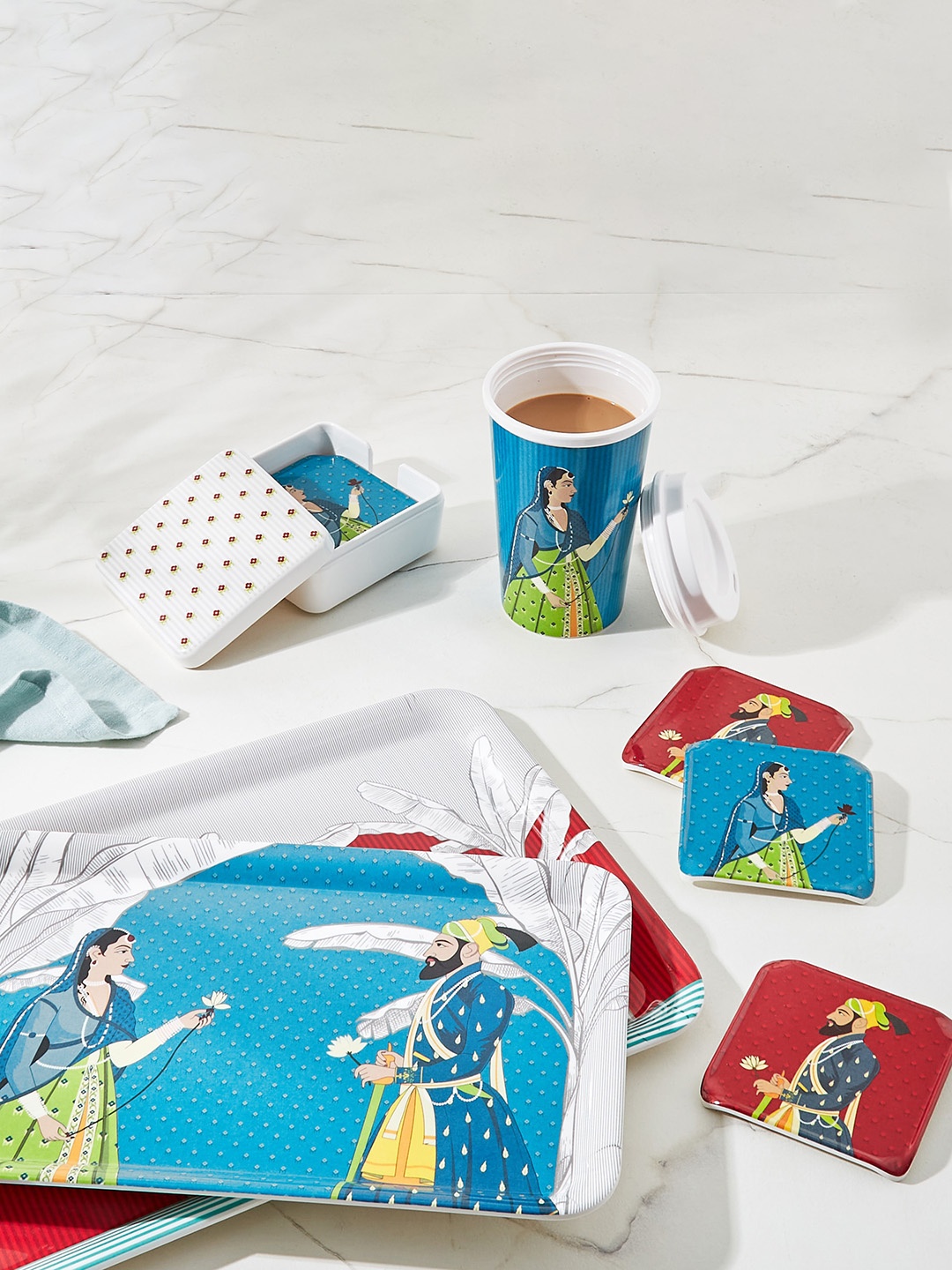 

Home Centre Raisa Raja Rani Blue Printed Melamine Tumbler with Lid - 425 ML