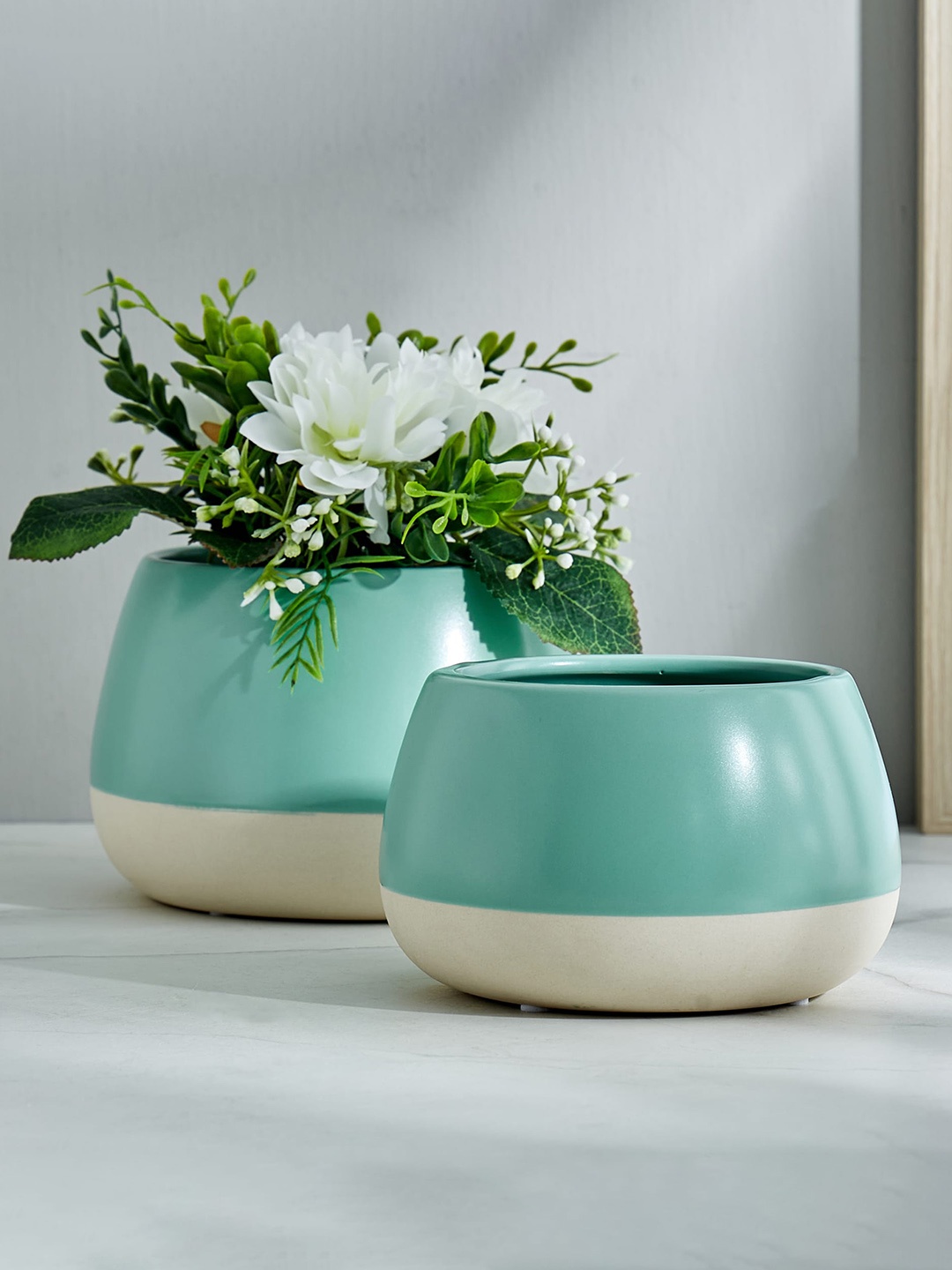 

Home Centre Garnet Grace Teal Green & White Ceramic Planter