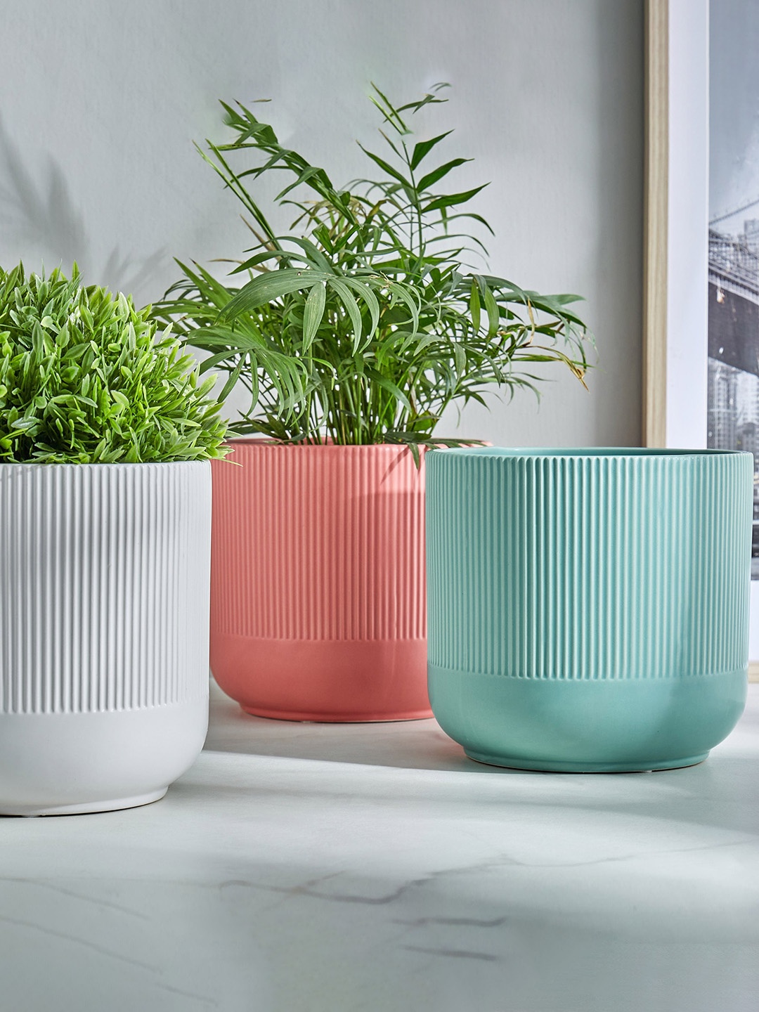 

Home Centre Gloria Argil Teal Green Ribbed Ceramic Planter
