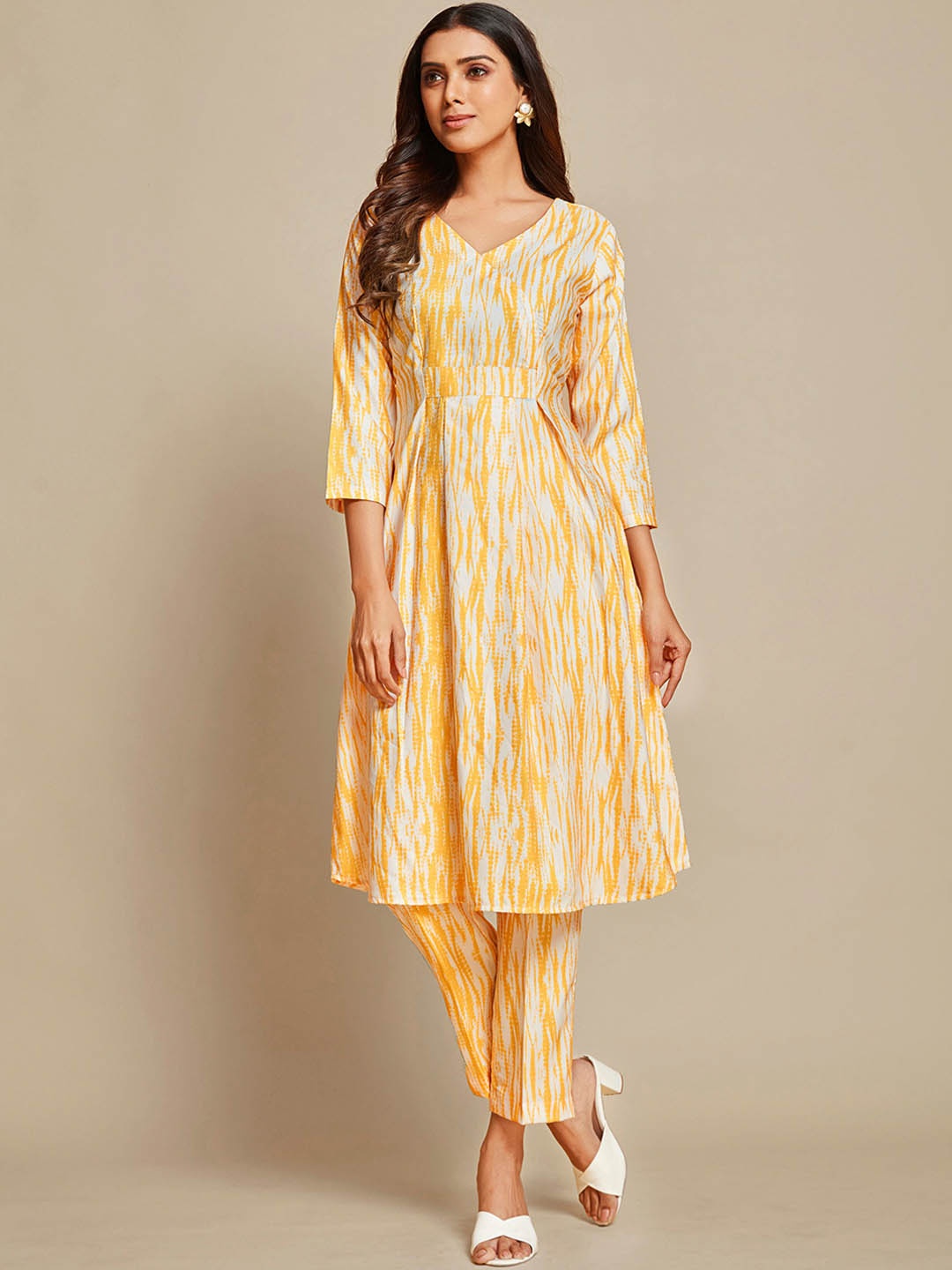 

Sangria Yellow Abstract Printed V-Neck Pure Cotton A-Line Kurta With Trousers