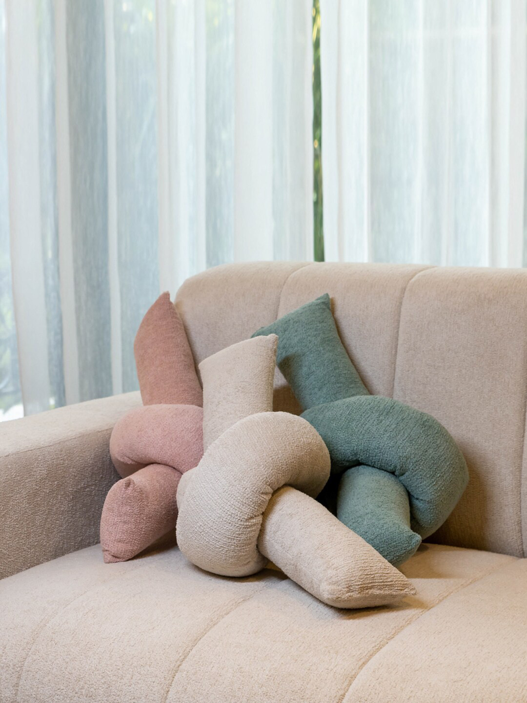 

Eris Home Teal Blue Knot Pre-Filled Cushion