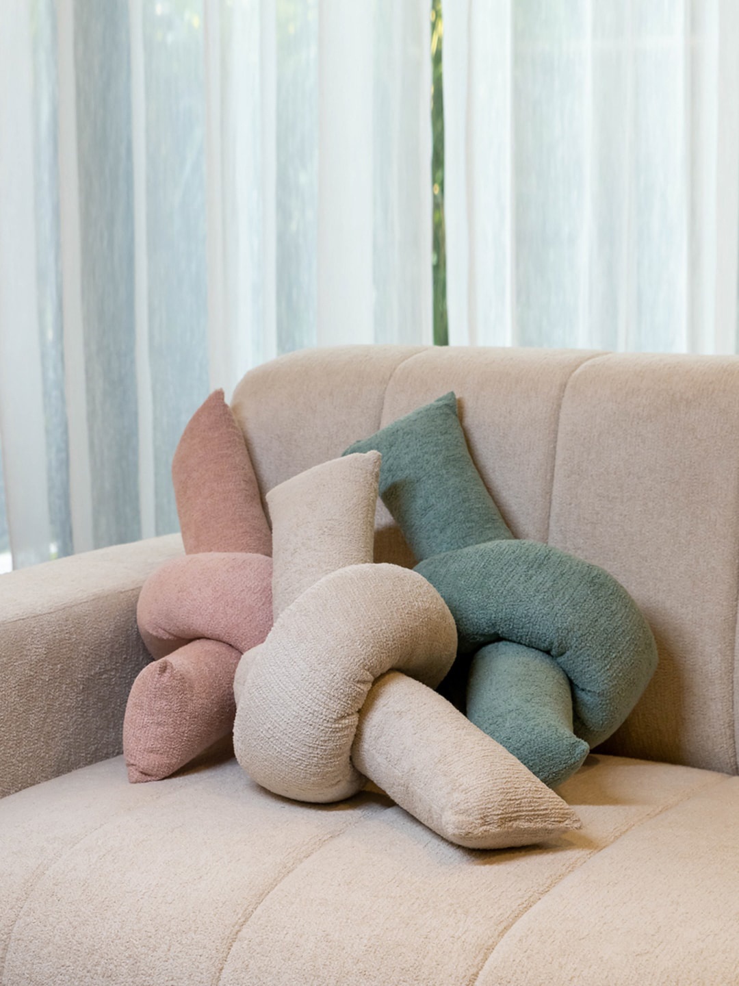 

Eris Home Pink Knot Pre-Filled Cushion