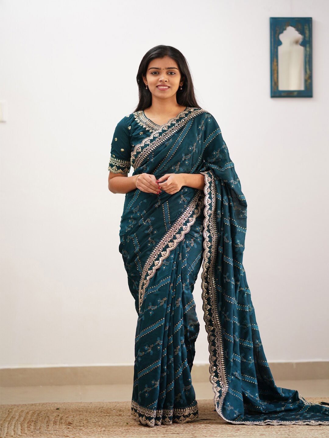 

Mitera Teal & Gold-Toned Woven Design Embroidered Silk Blend Saree