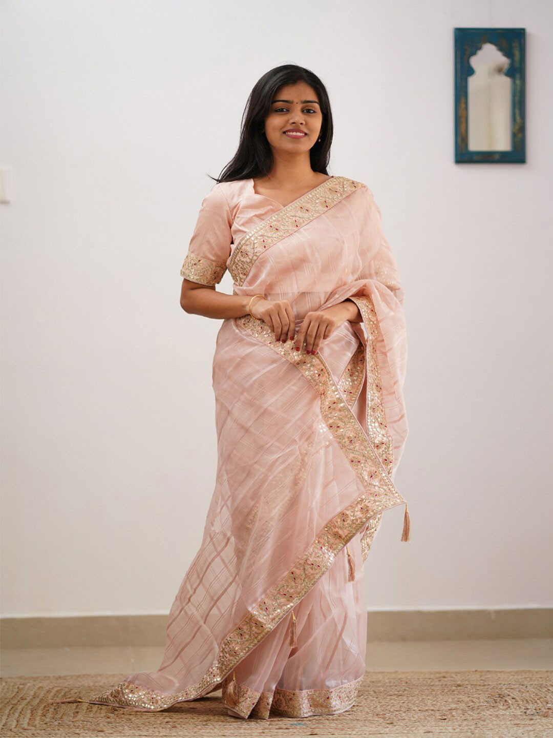 

Mitera Cream-Coloured & Gold-Toned Striped Embroidered Organza Saree