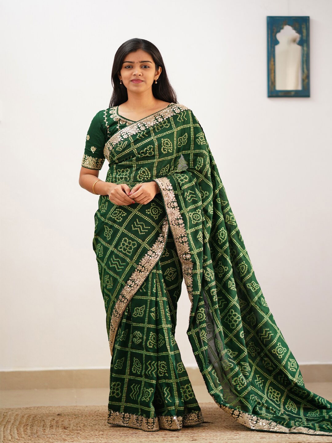 

Mitera Green & White Bandhani Printed Embroidered Saree