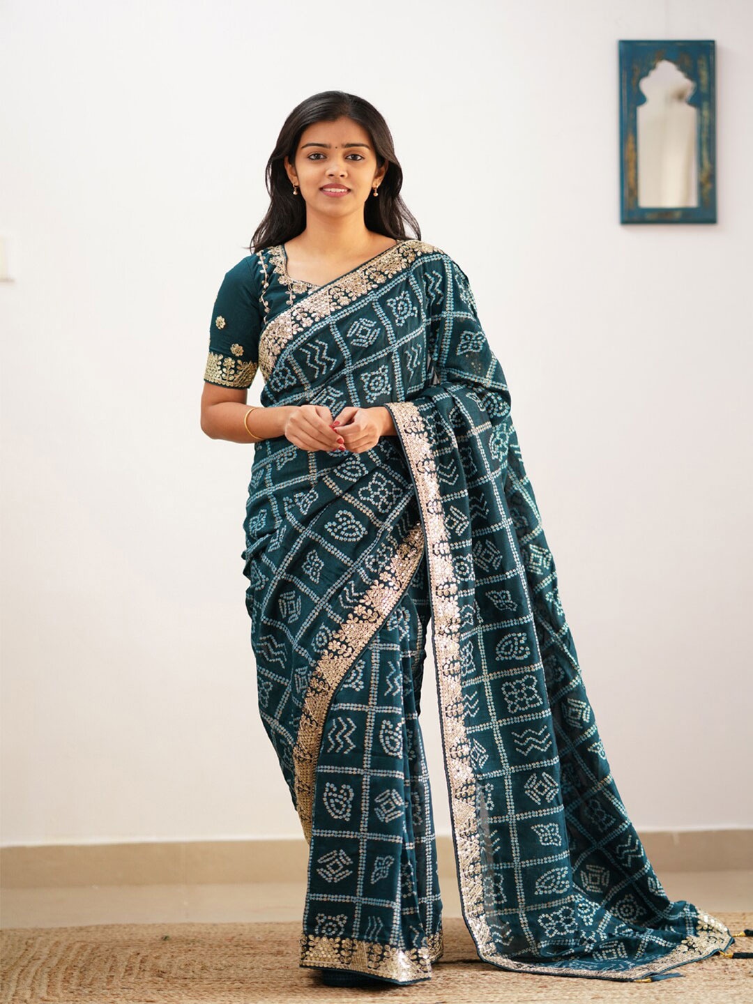 

Mitera Teal & Gold-Toned Bandhani Printed Embroidered Saree
