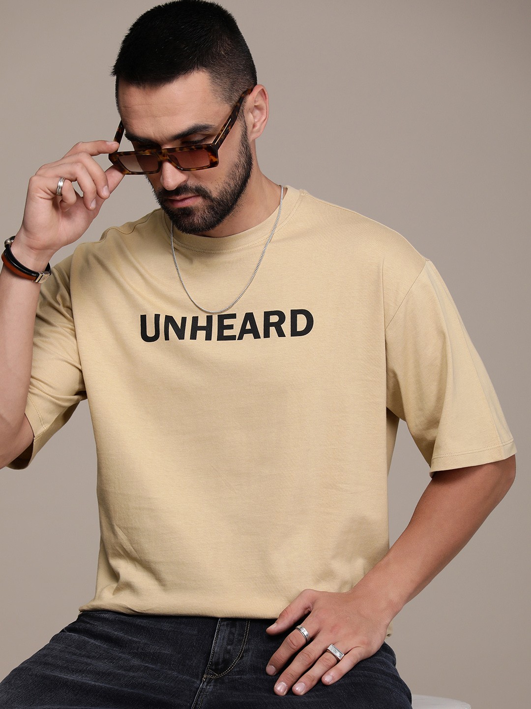 

The Roadster Life Co. Typography Printed Drop-Shoulder Sleeves Pure Cotton Relaxed T-shirt, Beige