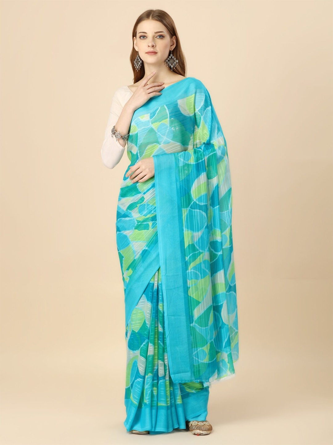 

Triveni Abstract Printed Pure Georgette Saree, Blue