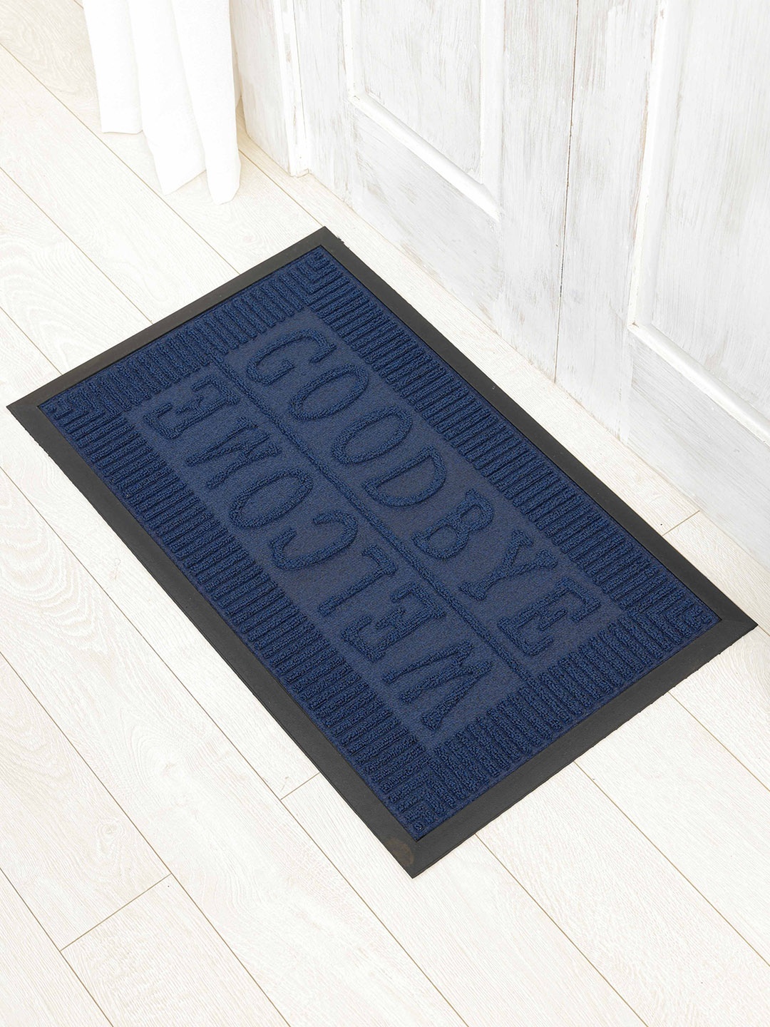 

Ariana Navy Blue Self Design Anti-Skid Doormat